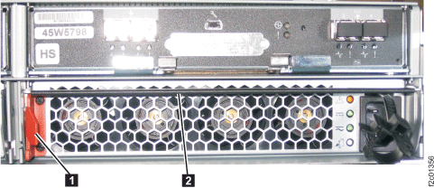 Storage enclosure power supply latch handle and retaining clip